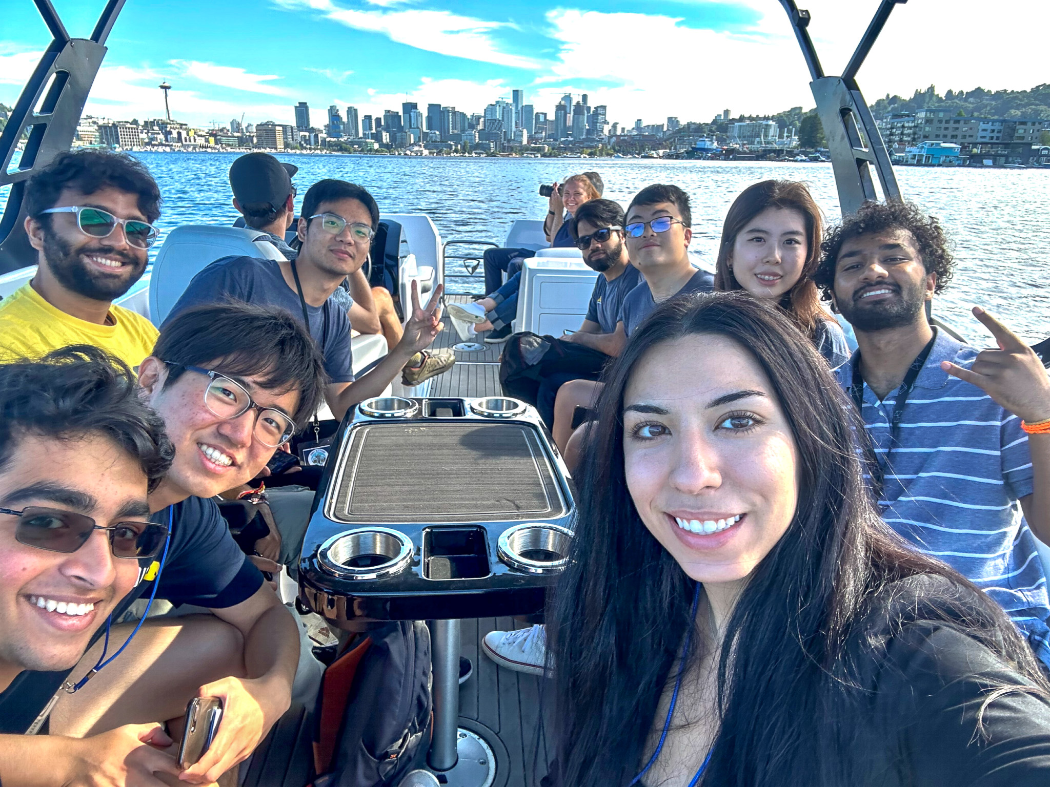 Students smile for a selfie on a watercraft during the Seattle Trek.