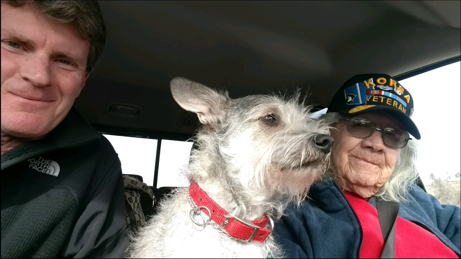 hris Quinn drives on Pine Ridge Reservation with Lakota Elder and Spiritual Leader Basil Braveheart (and dog Charlie!)