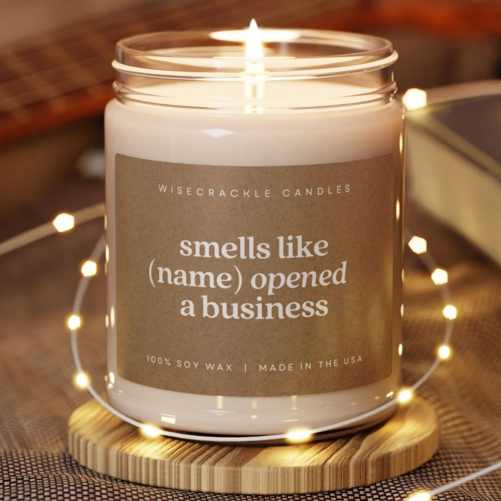 Candle reads "smells like (name) opened a business."