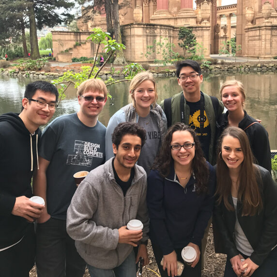 Arthur shi with a group of university of michigan ELP students in San Francisco. The group is standing in front of a river
