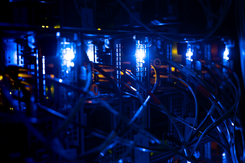 computational equipment line the inside of the Michigan Academic Computing Center (MACC) Data Center