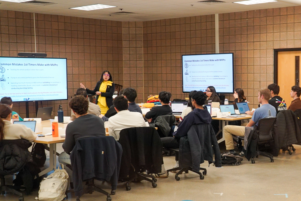 a group of ELP students with their instructor in class