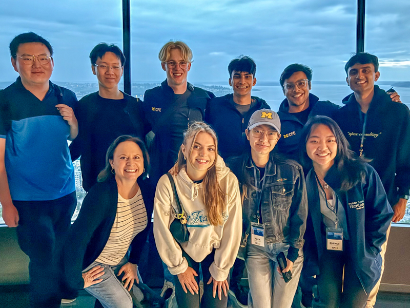 a group of students at the space needle in seattle