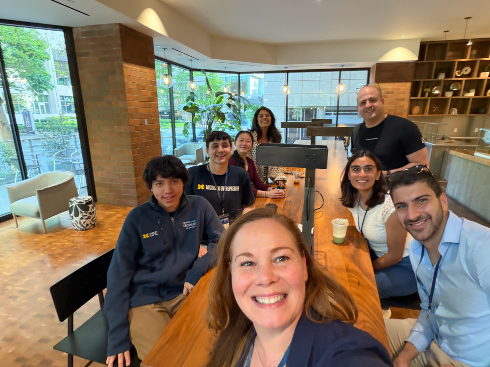 Students meeting with alumni at a coffee shop in seattle