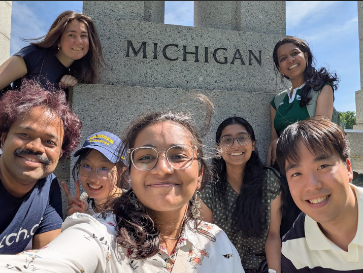 students in front of the WWII Memorial, while exploring DC
