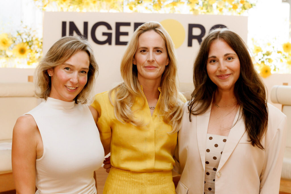 Mira poses with colleagues at Ingeborg Investments.